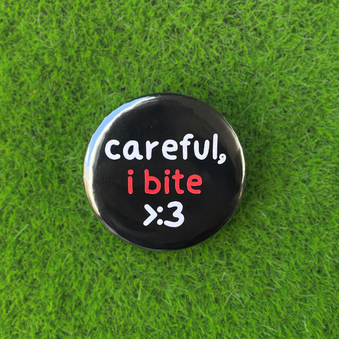‘Careful, I Bite’ Badge by Kitz Wurld